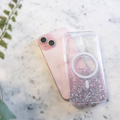 A pink iPhone 15 Starburst Glitter MagSafe Case - Bryten by Raptic with a flower on it.