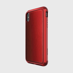 The Raptic iPhone XS Max Case - LUX is a red smartphone case with a textured back, camera cutout, and side button covers, made from impact-resistant polycarbonate for durability.