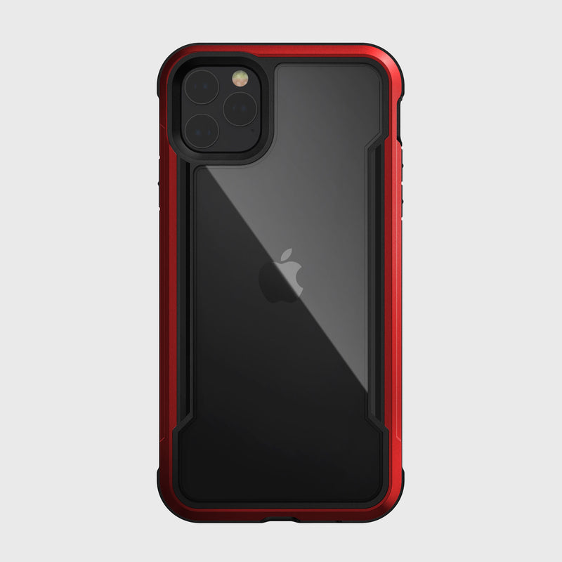 A Raptic SHIELD case with drop protection and a sleek aluminum alloy design encases a smartphone. The red and black cover sports the iconic Apple logo on the back.