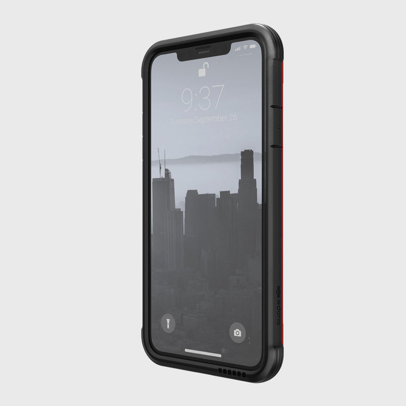 The iPhone 11 Pro Max, equipped with a Raptic SHIELD black and red rugged case for excellent drop protection, shows.