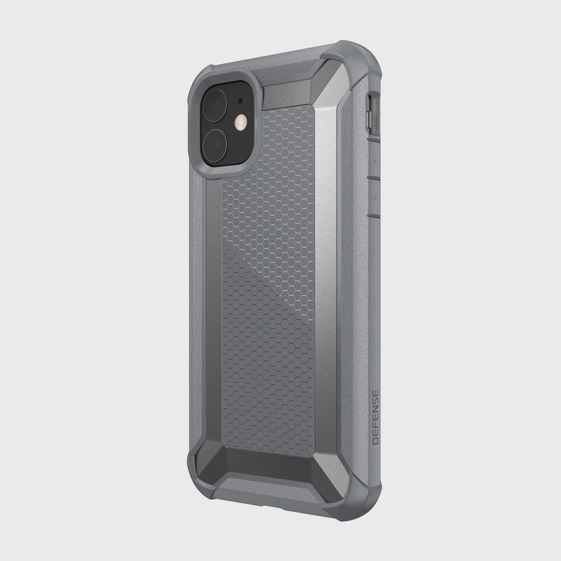 The Raptic iPhone 11 Case - TACTICAL is a silver and gray rugged phone case with a hexagonal pattern, featuring a shock-absorbing rubber exterior that meets Military Standard MIL-STD-810G for superior protection.