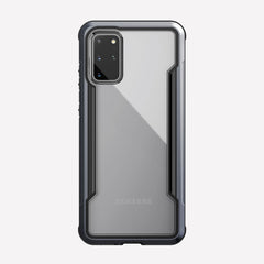 Defense shield black on a silver Galaxy S20+ showing the back view to show the back panel of the case on the device