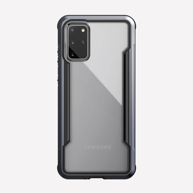Defense shield black on a silver Galaxy S20+ showing the back view to show the back panel of the case on the device