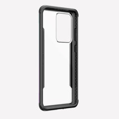 Defense shield iridescent on a silver Galaxy S20 Ultra showing the front raised lip to keep it safe from front-faced drops