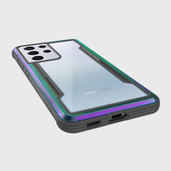 A X-Doria Samsung Galaxy S21 Ultra Case Raptic Shield Iridescent showcases military-grade drop protection, revealing the rear camera array and a
