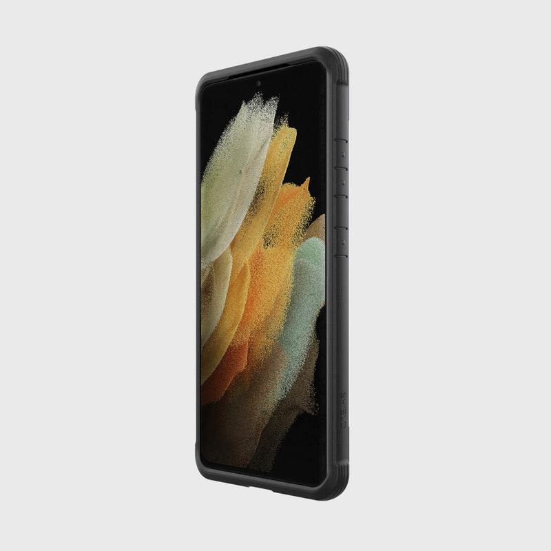 The back view of a Samsung Galaxy S21 Ultra Case Raptic Shield Black with drop protection and an X-Doria Defense Shield case.