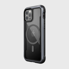 The rugged black Raptic SHIELD PRO MAGNET case for iPhone 12 & iPhone 12 Pro showcases visible camera lenses and the Apple logo, highlighting button details. It offers drop protection, MagSafe compatibility, and blends durability with functionality.