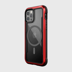 The Raptic SHIELD PRO MAGNET case for iPhone 12 & 12 Pro features a red and black design with a transparent back, circular design around the Apple logo, drop protection, and seamless MagSafe compatibility.