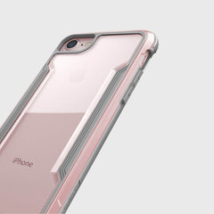 The back of an iPhone SE/8/7 Case - SHIELD in pink and silver by Raptic.
