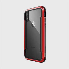 The Raptic SHIELD case for iPhone XR is transparent with a rugged red and black design. It showcases the Apple logo and provides military-grade drop protection, combining style with excellent shock absorption to safeguard your device against accidental drops.