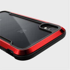 Close-up of a vibrant red iPhone XR case by Raptic, highlighting the dual camera and flash. The SHIELD case offers military-grade drop protection and exceptional shock absorption for peace of mind during use.