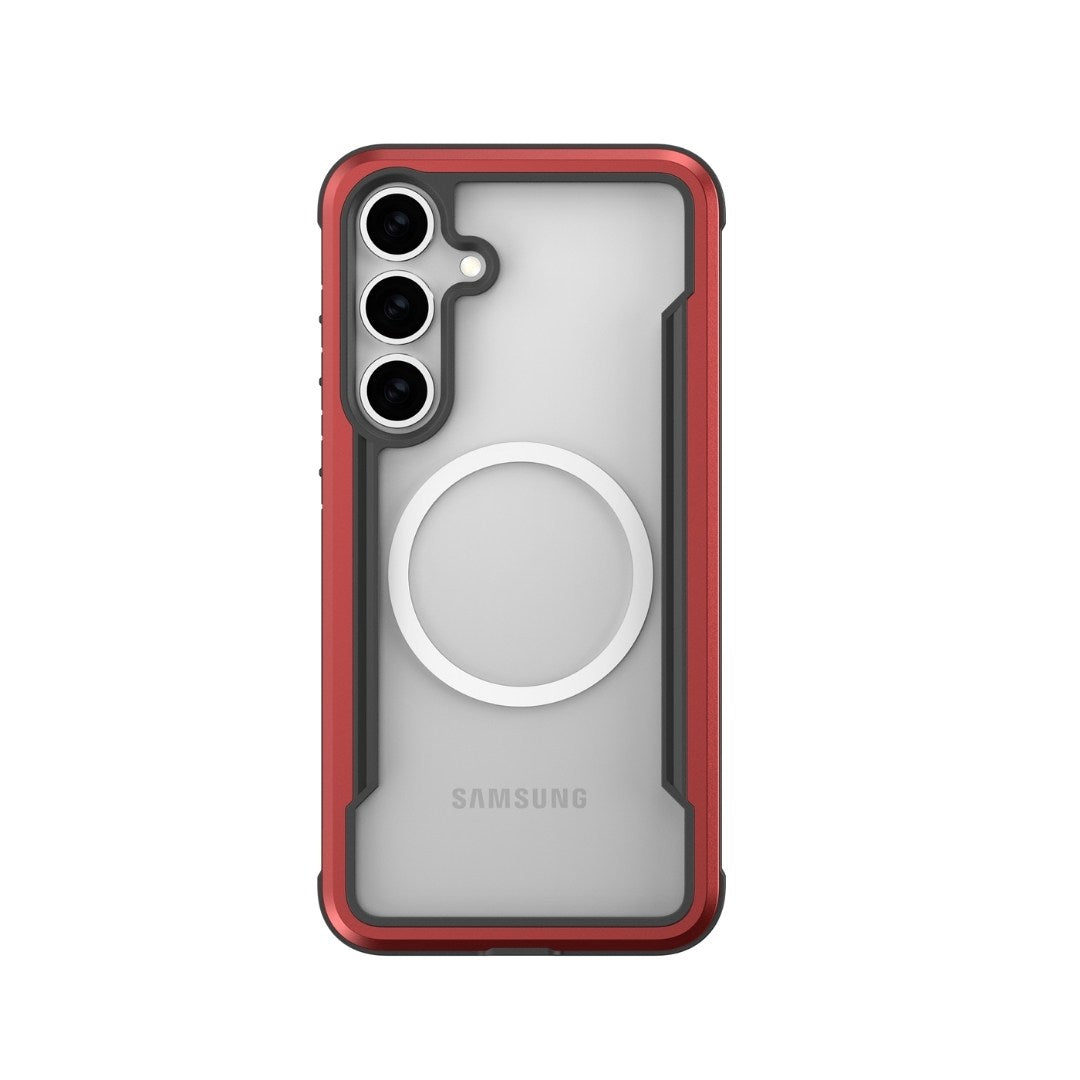 The Samsung Galaxy S25, enclosed in a vivid red Raptic SHIELD case, boasts three rear camera lenses and a circular back design. Benefit from military-grade drop protection and antimicrobial treatment for safety and cleanliness.