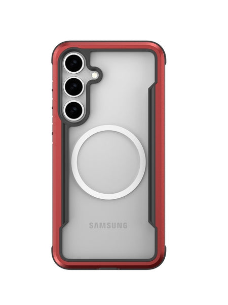 The Samsung Galaxy S25, enclosed in a vivid red Raptic SHIELD case, boasts three rear camera lenses and a circular back design. Benefit from military-grade drop protection and antimicrobial treatment for safety and cleanliness.