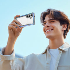 A person smiles and looks upwards on a clear day, confident their Samsung Galaxy S25 is safe in a Raptic SHIELD case with military-grade drop protection.