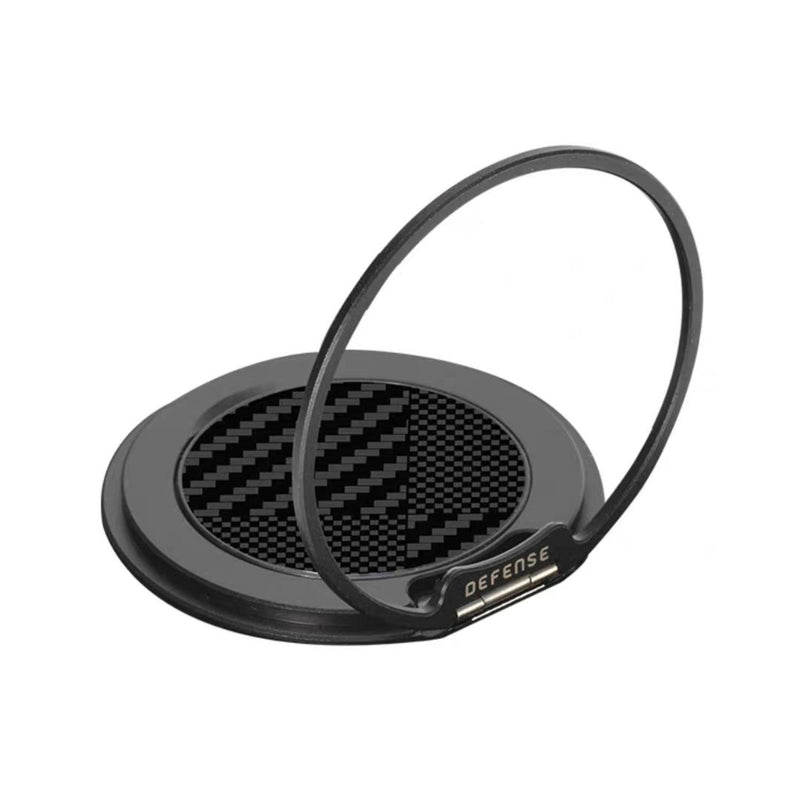 The Raptic Ring is a black circular MagSafe compatible magnetic phone ring holder with a carbon fiber pattern center and 