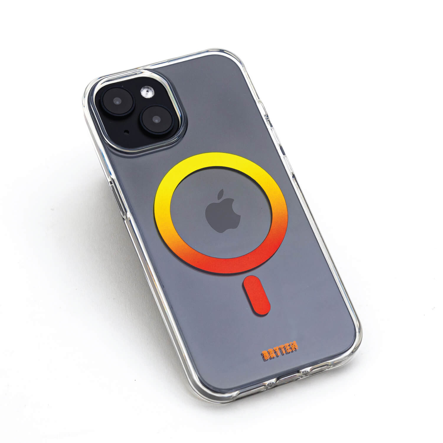 A clear iPhone 15 MagFx MagSafe case by Bryten, with a vibrant orange and yellow circle, perfect for wireless charging.