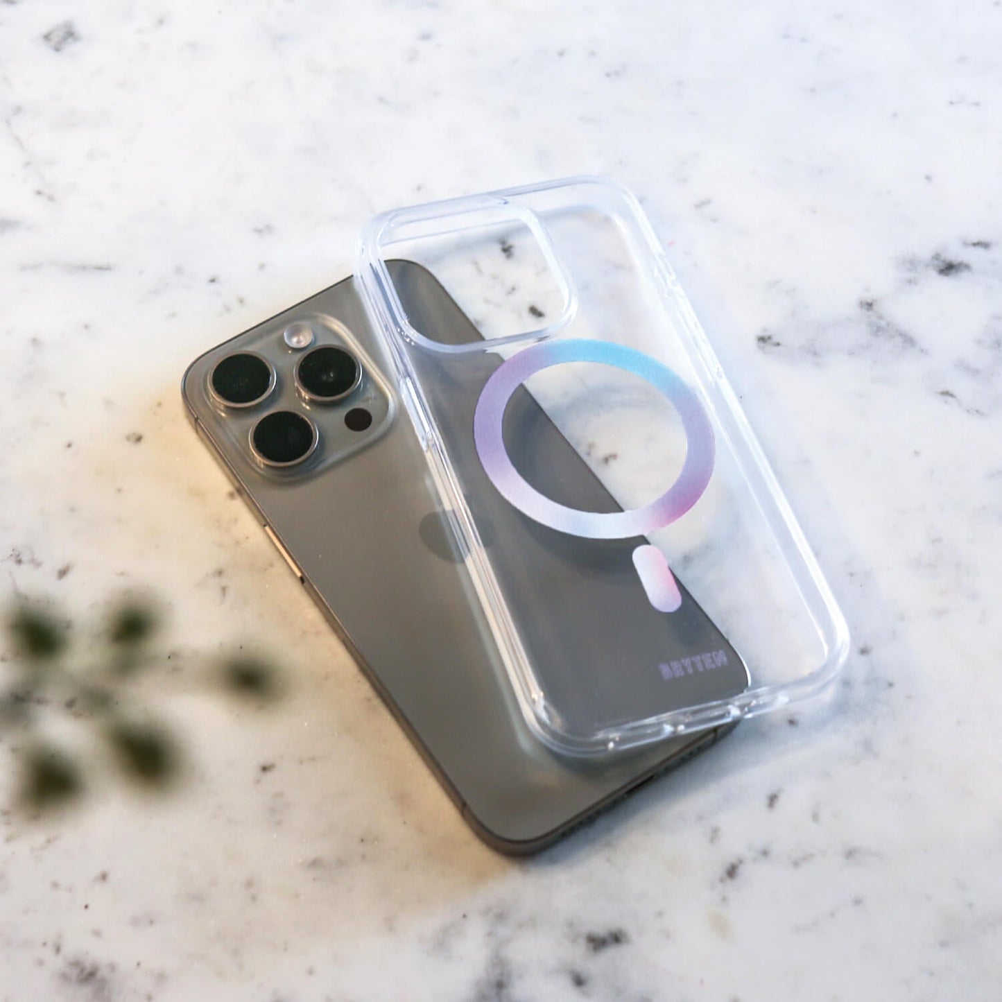 A clear phone case with a circle on it, designed for iPhone 15 MagFx and wireless charging - Bryten by Raptic.