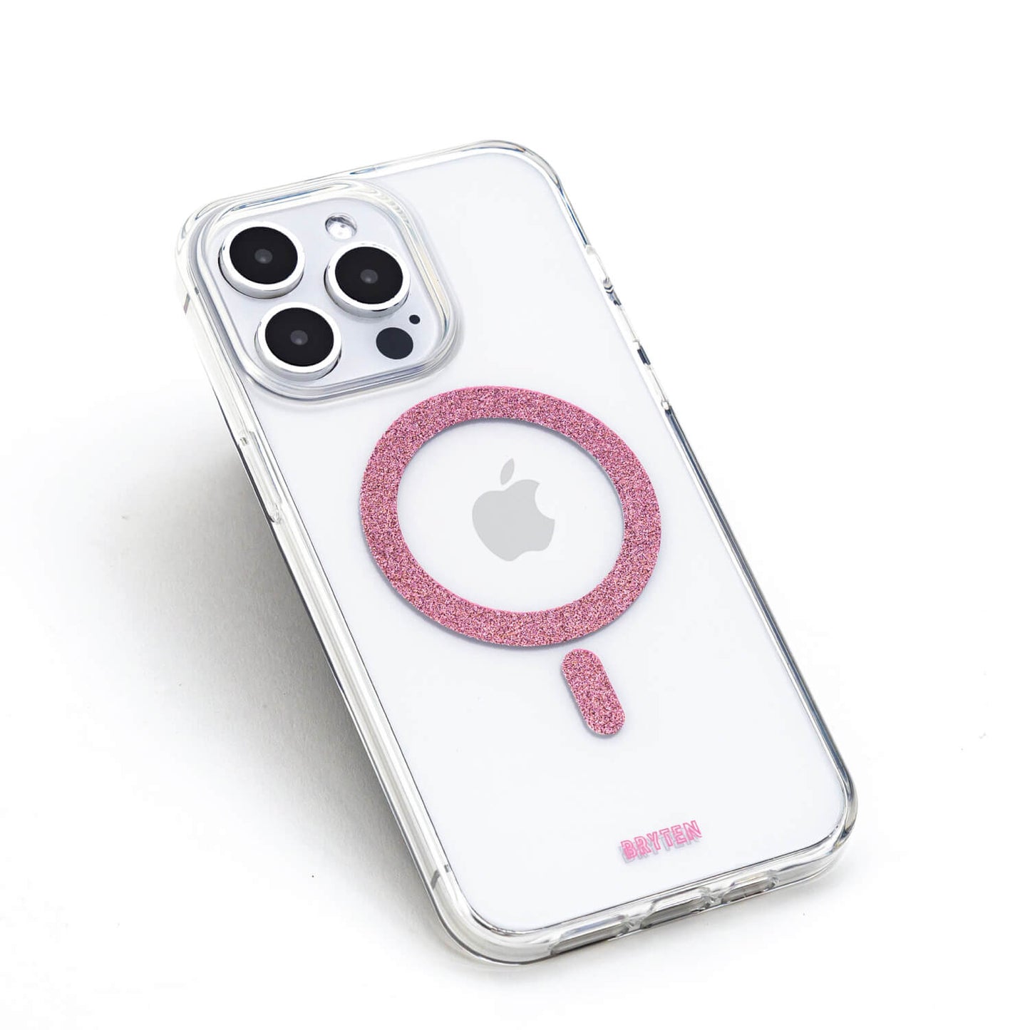 A clear iPhone 15 MagFx MagSafe Case - Bryten by Raptic with a pink logo on it, compatible with MagSafe charger.