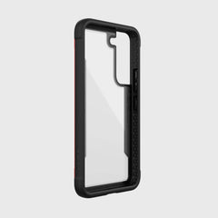 A black and red Raptic case with drop protection for the Samsung Galaxy S22 SHIELD.