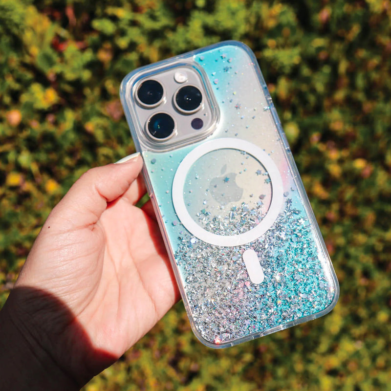 A person holding an iPhone 15 Starburst Glitter MagSafe Case - Bryten by Raptic embraces the convenience of wireless charging thanks to the cutting-edge MagSafe technology.