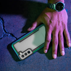 A hand holding a Raptic Samsung Galaxy S22 Case - SHIELD with antimicrobial protection.