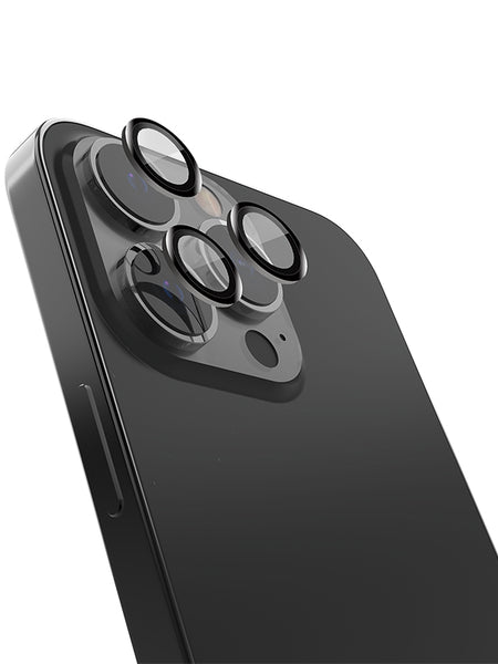 A Raptic iPhone 15 Pro with a Raptic Armour camera protector lens attached to its tempered glass.