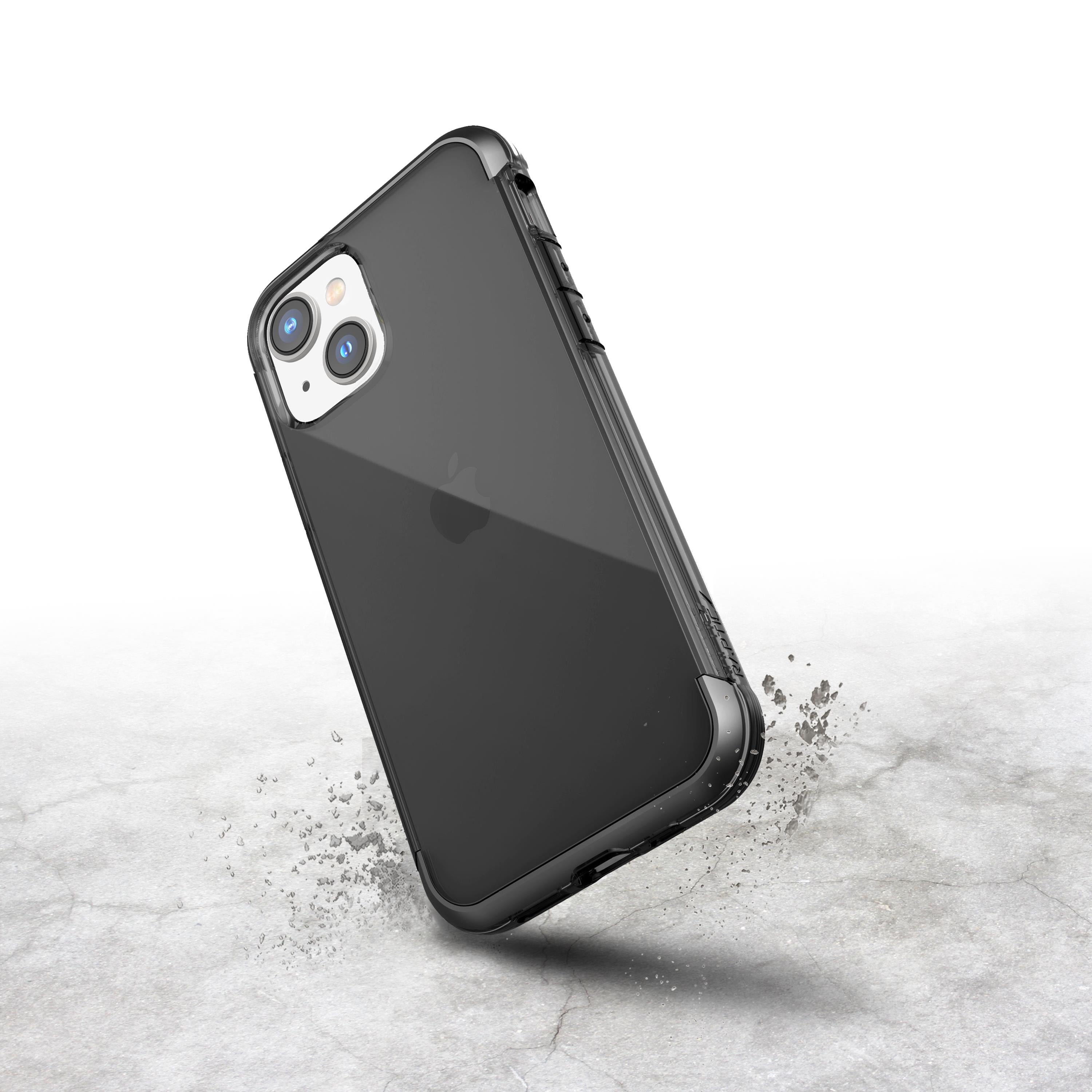 A protective black iPhone 14 Air Case - Raptic Air on a concrete surface.