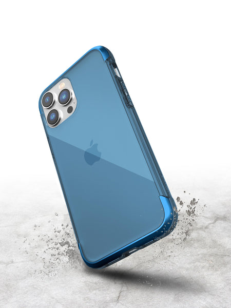 A protective iPhone 14 Pro Air Case - Raptic Air with aluminium alloy strength for iPhone 11 Pro on a concrete surface.