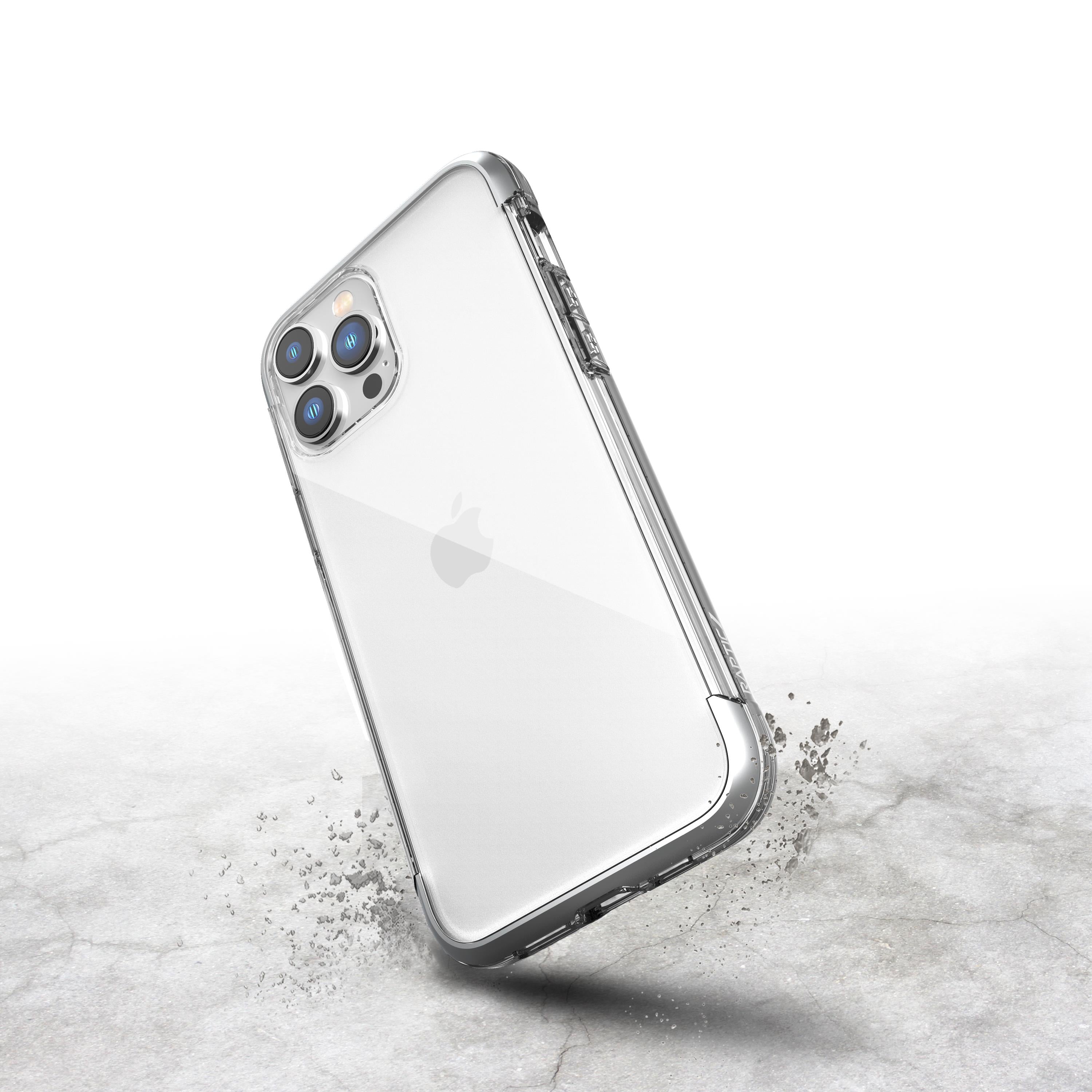 A sturdy metal iPhone 14 Pro protective case, the Raptic Air, on a concrete surface.