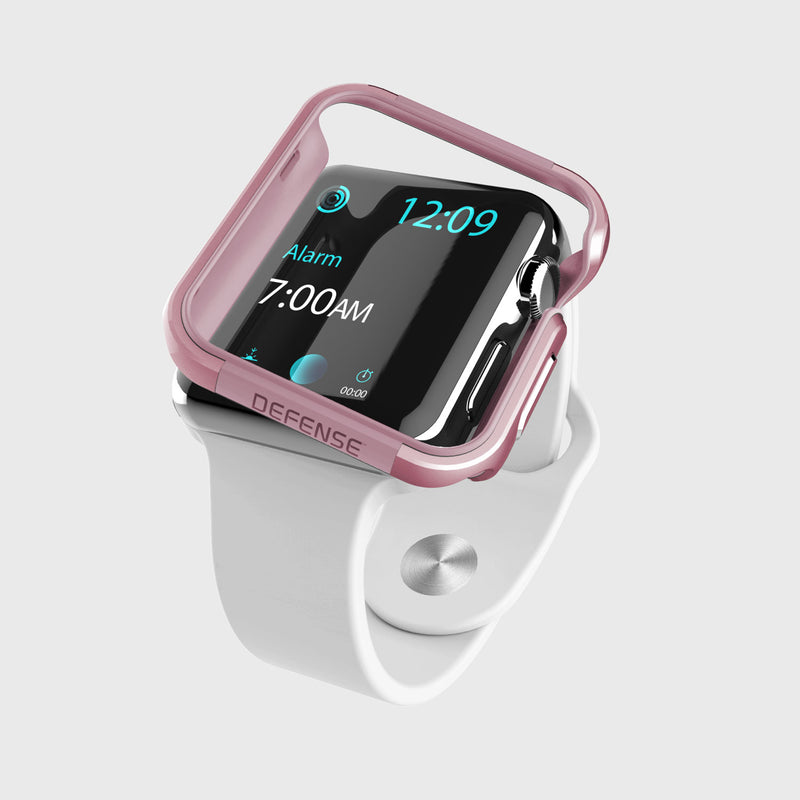 Smartwatch with a white band and pink protective Apple Watch 40mm Case - EDGE by Raptic for added scratch protection, showing the time 12:09 and an alarm set for 7:00 AM.