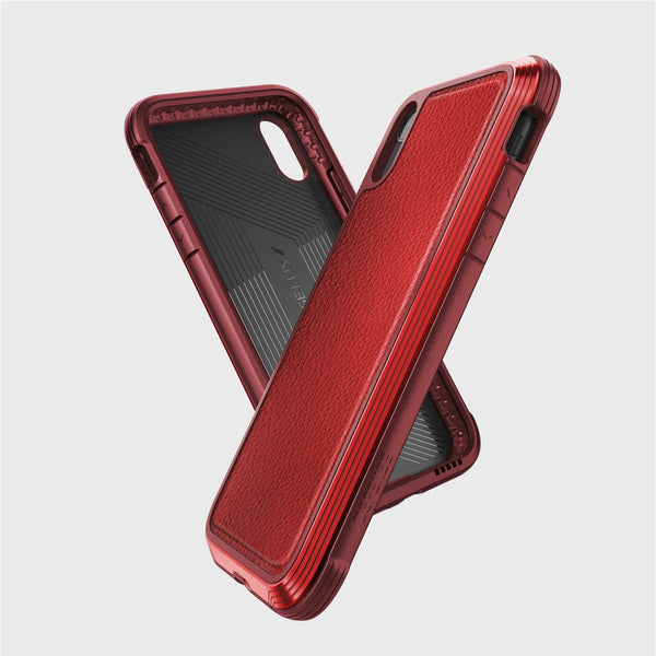 Two red Raptic iPhone XR LUX cases with textured backs are shown overlapping against a white background, crafted from impact-resistant polycarbonate for reliable defense.