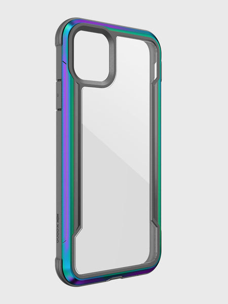 The iPhone 11 Case - SHIELD by Raptic features a blue and purple gradient metallic frame, clear back, and aluminum alloy construction. This sleek accessory is perfect for protecting dual-camera smartphones and is compatible with wireless charging.