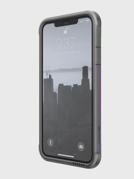 The iPhone 11 Pro rests in Raptic's SHIELD transparent case, displaying a cityscape lock screen at 9:37 on Tuesday, September 26. Its sleek design includes aluminum alloy edges and supports wireless charging for easy use.