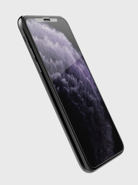 Defense Glass edge to edge is hovering over a black iphone 11 pro max