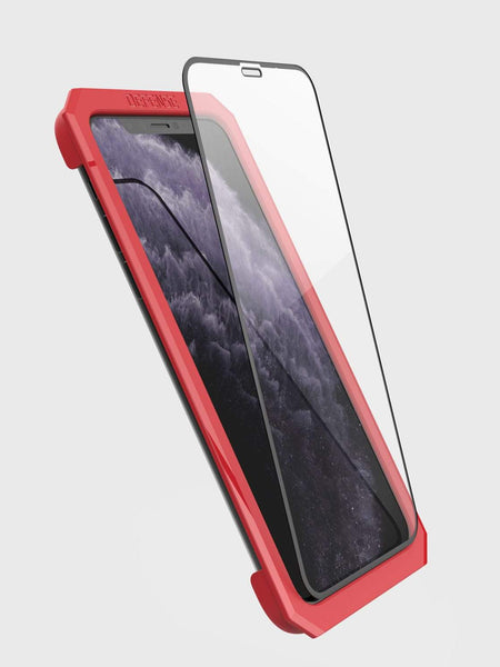 Showing defense glass flat on phone 11 pro max using installation tool