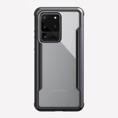 Defense shield black with a silver Galaxy S20 Ultra in it showing the back view with the black color on the back panel and that it's transparent