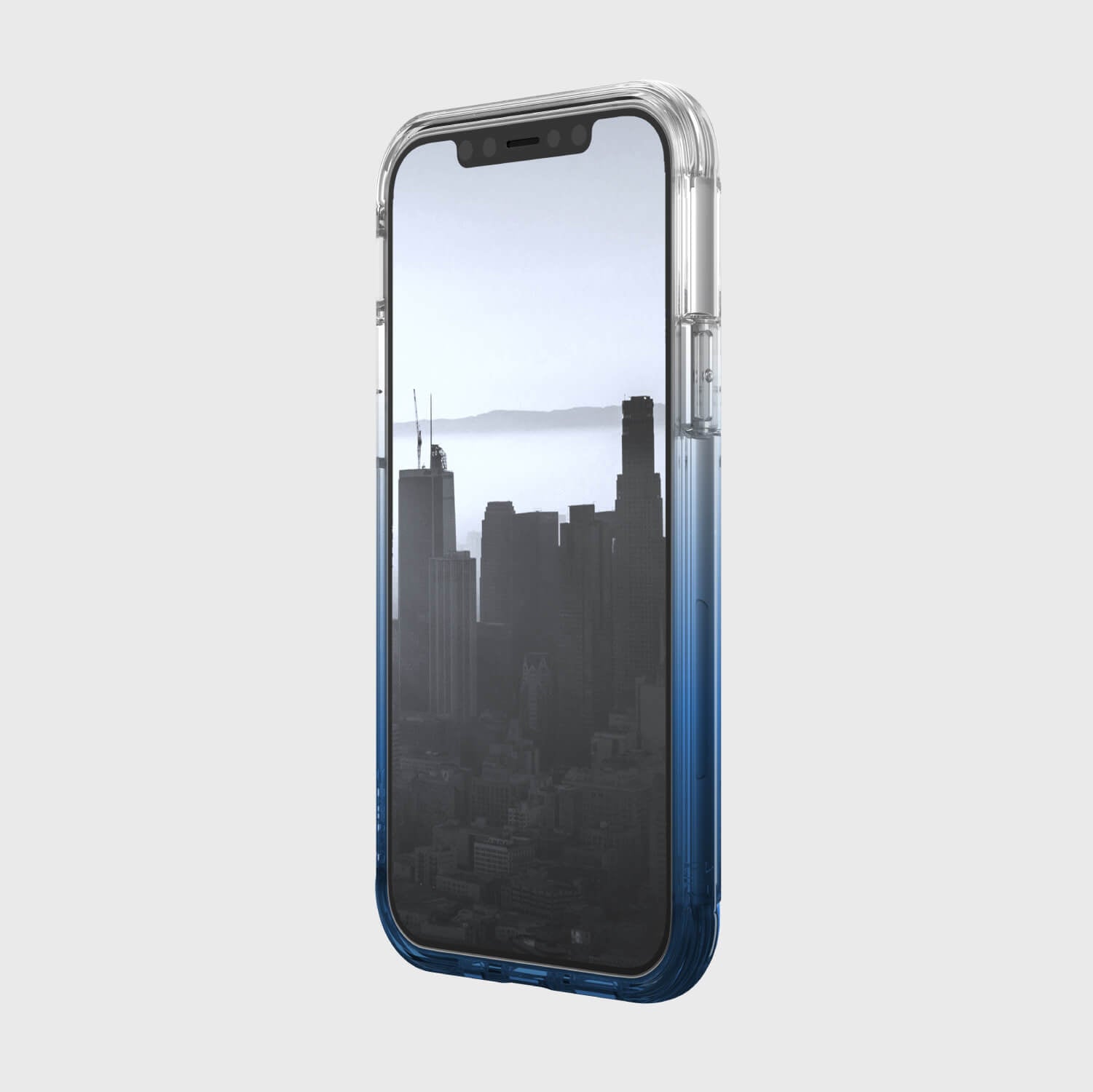 A blue Raptic iPhone 12 Pro Max case with 4-metre drop protection and Wireless Charging compatibility, showcasing a view of a city skyline.