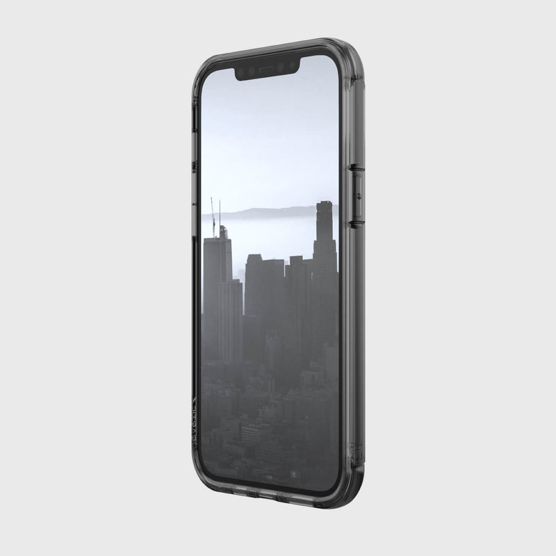 A Raptic iPhone 13 Pro Max Case - AIR with a view of the city offering 13 foot drop protection.