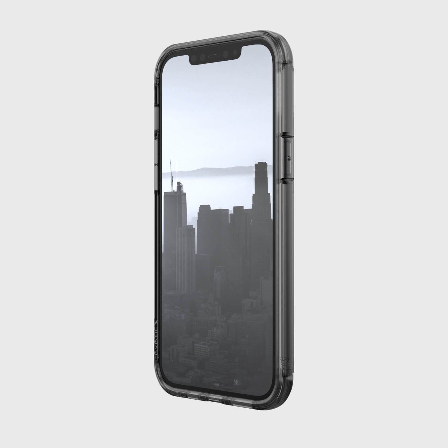A Raptic iPhone 13 Pro Max Case - AIR with a view of the city offering 13 foot drop protection.