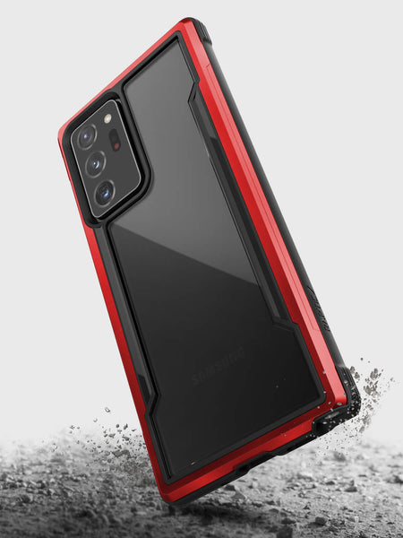The X-Doria Galaxy Note 20 Ultra Raptic Shield case - Red offers drop protection and wireless charging capability in a stunning red and black design.