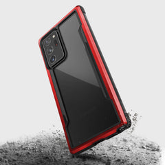 The X-Doria Galaxy Note 20 Ultra Raptic Shield case - Red offers drop protection and wireless charging capability in a stunning red and black design.