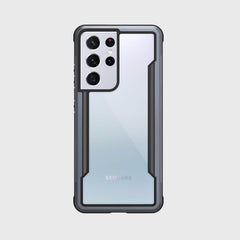 A Samsung Galaxy S21 Ultra Case Raptic Shield Black designed for the Samsung Galaxy S20, offering drop protection and featuring a camera on the back by X-Doria.