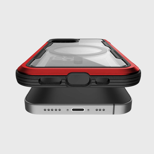 The Raptic SHIELD PRO MAGNET case for iPhone 12 and iPhone 12 Pro is displayed above a smartphone, featuring its protective elements like drop protection and a clear back, compatible with MagSafe chargers.