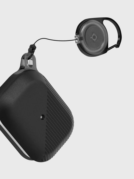 A black Raptic device with an Apple AirPods Pro Case - RADIUS attached to it for protection.