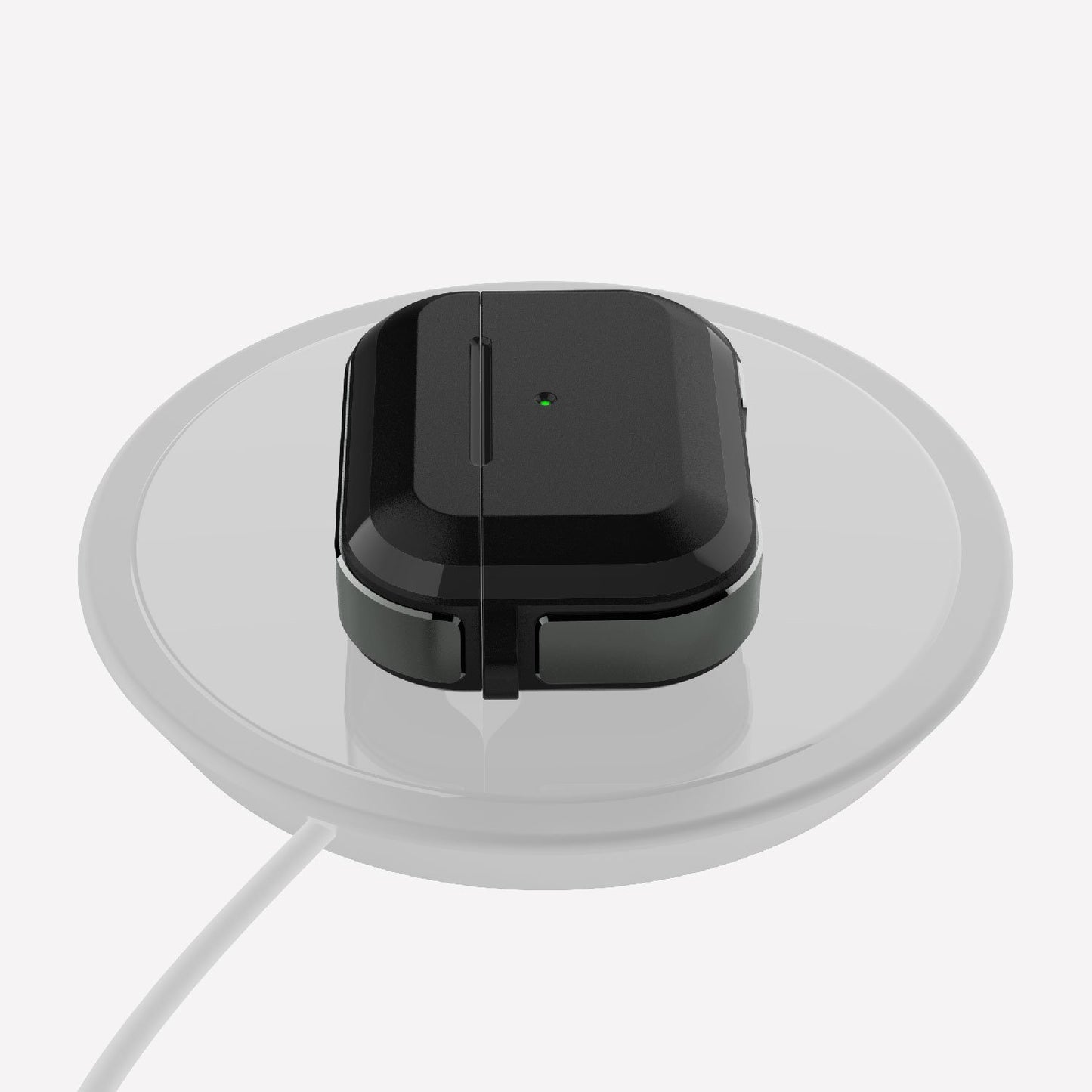 A black wireless charger is sitting on top of a white surface, providing convenient wireless charging for devices such as Raptic Apple AirPods Pro Case - TREK.