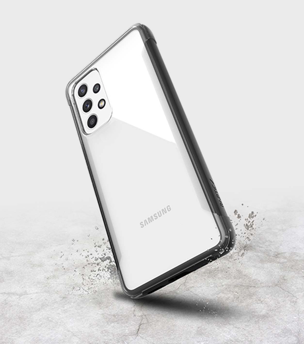 A Raptic Strong Samsung Galaxy A53 smartphone with a reflective back and quad-camera setup, encased in a Raptic EARTH eco-friendly, biodegradable protective cover, levitating above a concrete surface with a slight splash effect.