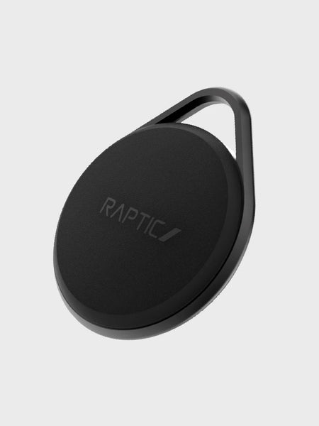 A black Apple AirTag Case - LINK with the word Raptic on it.
