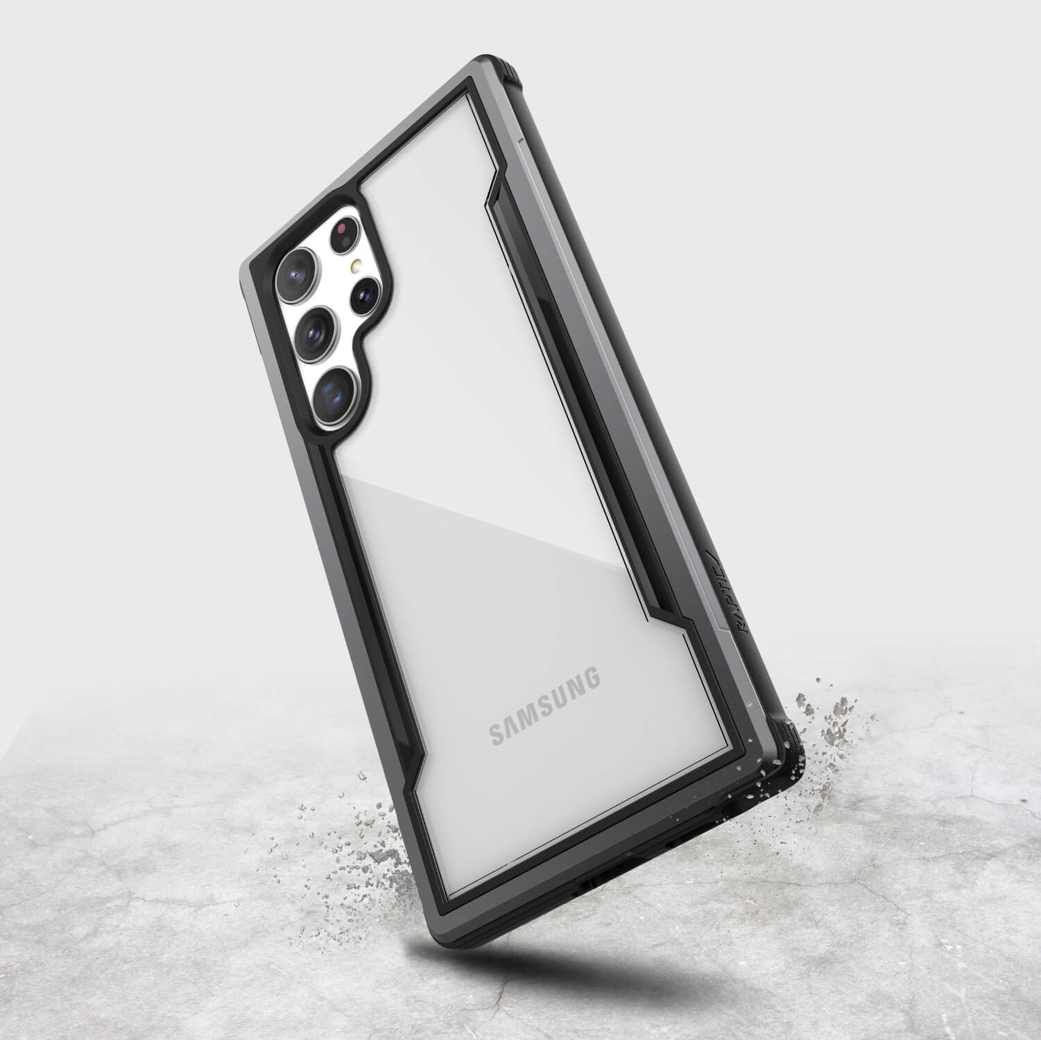 The Raptic Samsung Galaxy S22 Ultra Case - SHIELD is shown on a concrete surface.