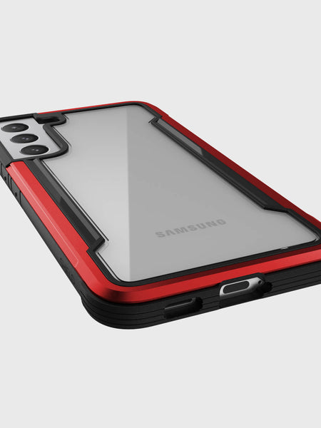 A Raptic Samsung Galaxy S23+ Case - SHIELD in red and black.