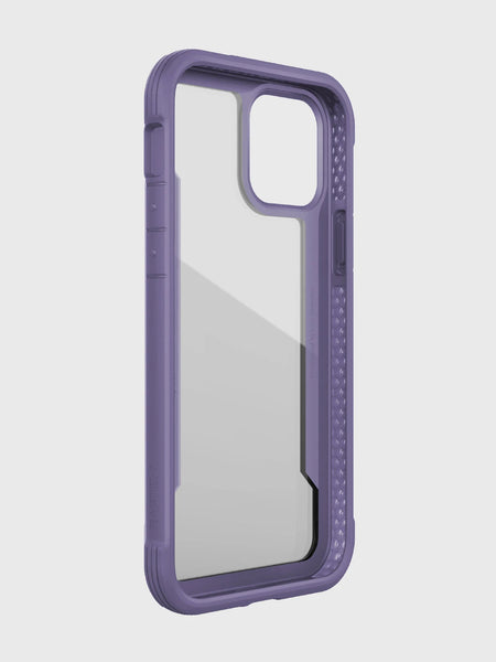 The iPhone 12 Raptic Shield case in purple by Raptic features a transparent back and a machined aluminum bumper. It's designed for dual-lens camera smartphones and supports wireless charging.